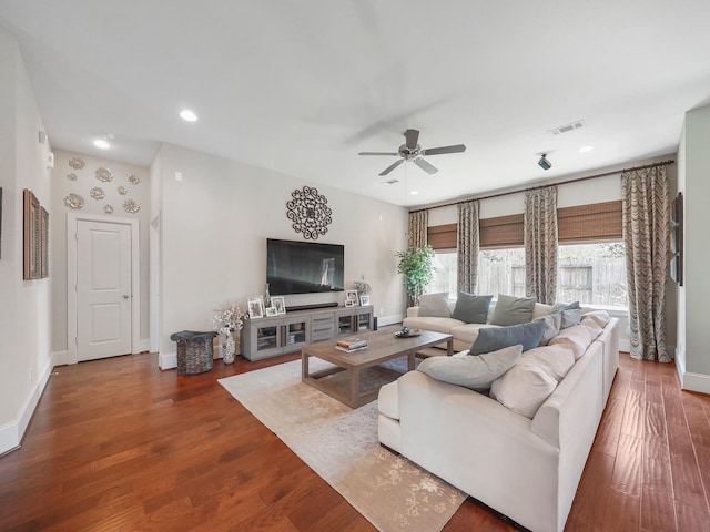 living area featuring recessed lighting, visible vents, ceiling fan, wood finished floors, and baseboards