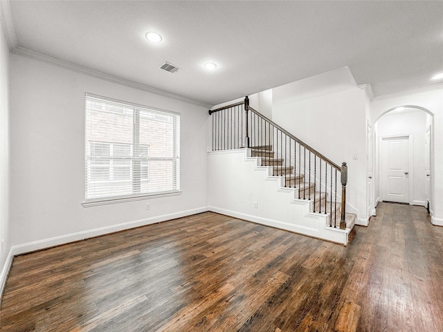 717 Via Lago, Webster, TX 77598 - stairway featuring ornamental molding, wood finished floors, baseboards, recessed lighting, and arched walkways