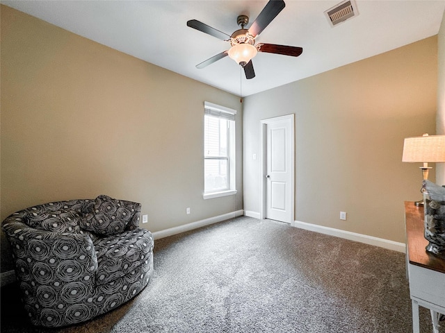 717 Via Lago, Webster, TX 77598 - sitting room featuring a ceiling fan, carpet, and baseboards