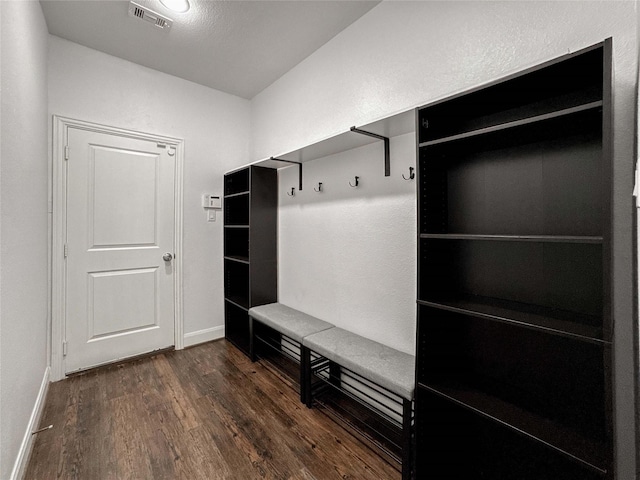717 Via Lago, Webster, TX 77598 - mudroom featuring dark wood-type flooring and baseboards