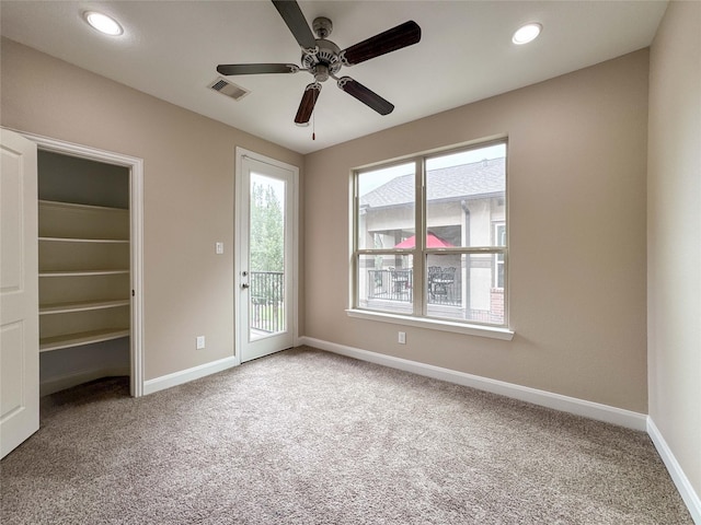717 Via Lago, Webster, TX 77598 - unfurnished bedroom featuring access to outside, carpet floors, baseboards, and recessed lighting
