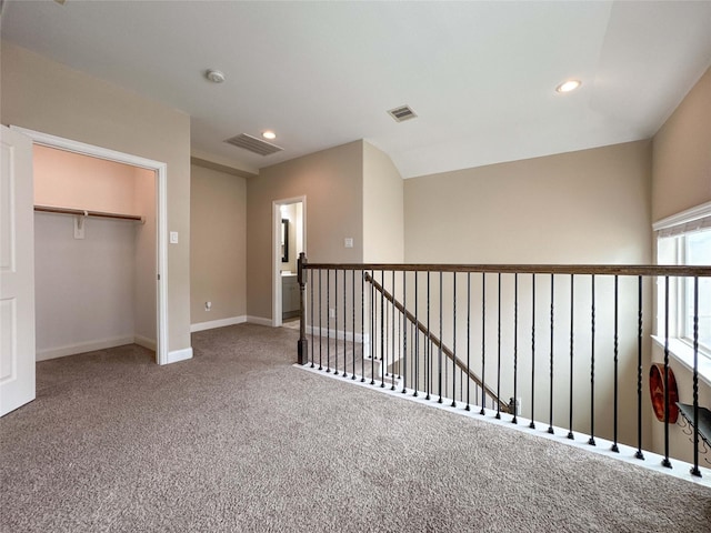 717 Via Lago, Webster, TX 77598 - corridor with carpet, recessed lighting, baseboards, and an upstairs landing