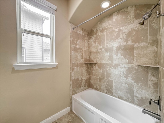 717 Via Lago, Webster, TX 77598 - bathroom with baseboards and shower / bathtub combination