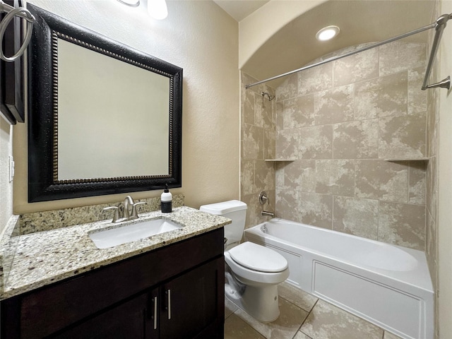 717 Via Lago, Webster, TX 77598 - full bathroom featuring toilet, shower / bathtub combination, vanity, and a textured wall