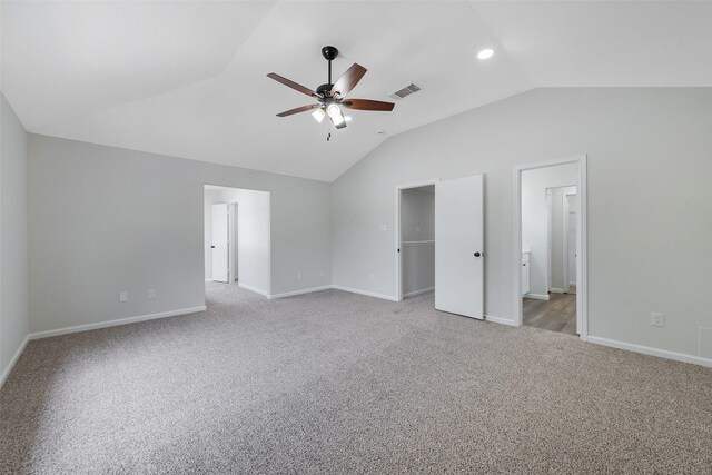 14415 Bryce Meadow Ln, Houston, TX 77047 - unfurnished bedroom with carpet floors, baseboards, visible vents, and vaulted ceiling