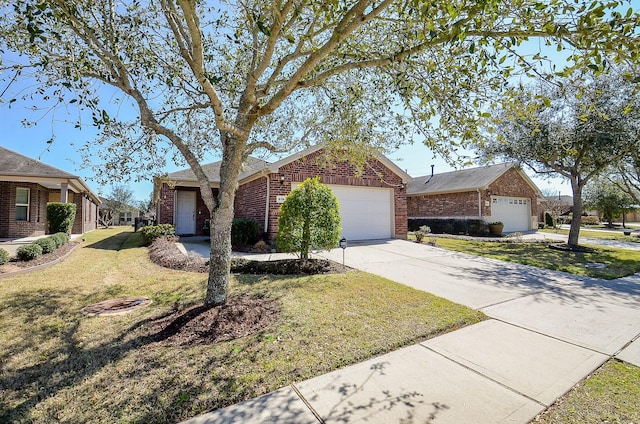 ranch-style house with a garage, a front yard, brick siding, and driveway