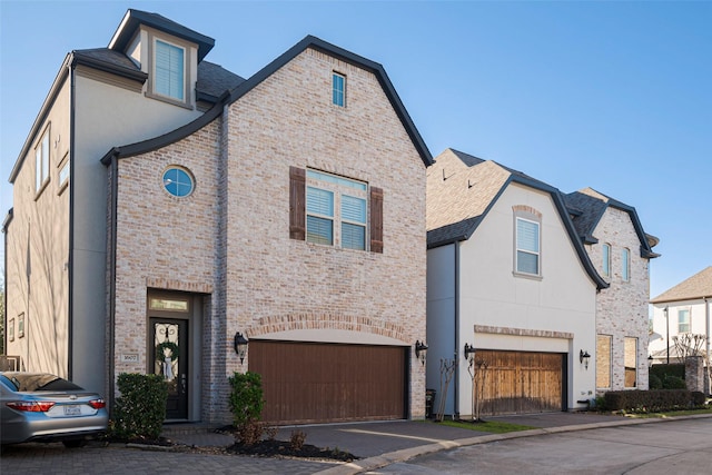 view of front of house featuring brick siding