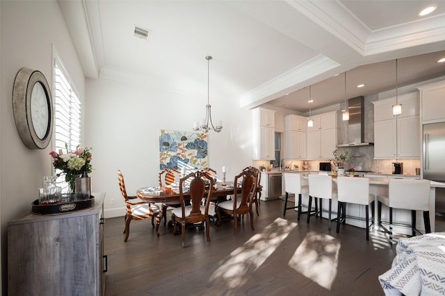 dining space featuring visible vents, ornamental molding, and dark wood-style flooring