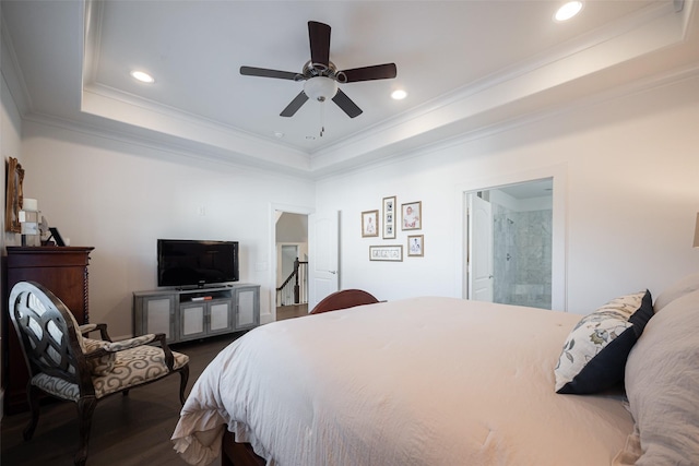 bedroom with a raised ceiling, a ceiling fan, dark wood finished floors, ornamental molding, and recessed lighting