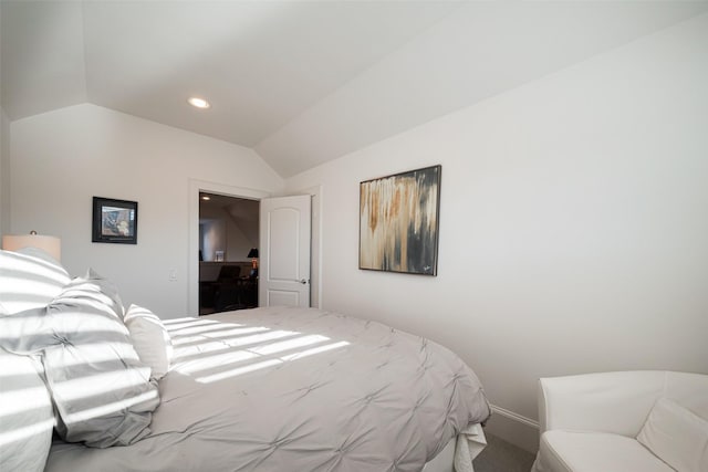 bedroom with lofted ceiling and recessed lighting