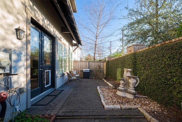 view of patio with a fenced backyard