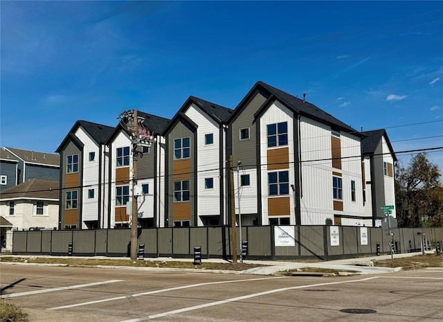 view of property with a residential view