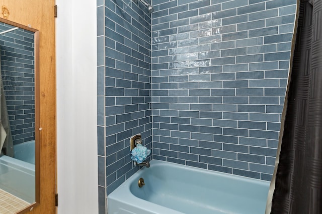 bathroom featuring shower / bath combination with curtain