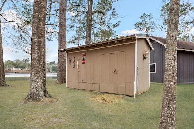 view of shed featuring a water view