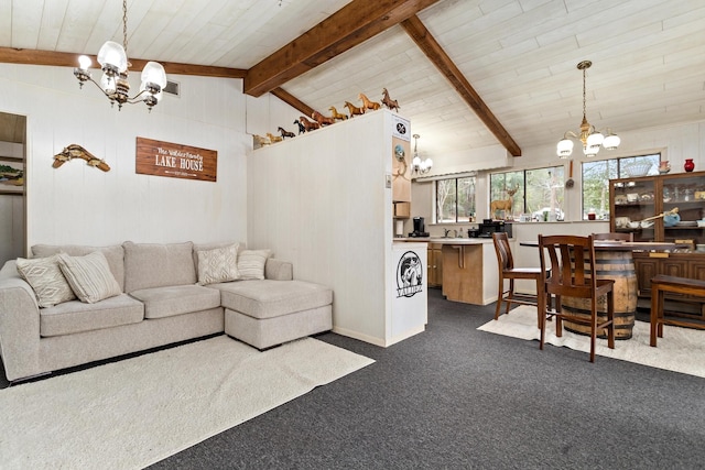 living room with a chandelier, dark colored carpet, lofted ceiling with beams, and wooden ceiling