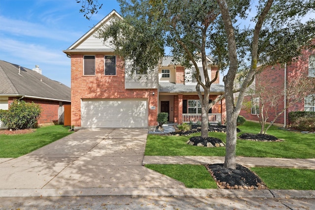 traditional-style home with covered porch, brick siding, driveway, and a front lawn