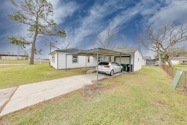 view of front of home featuring a garage, fence, a front lawn, and concrete driveway