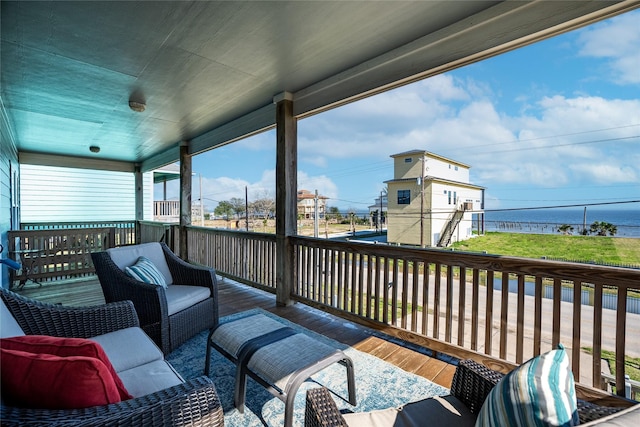 wooden deck with outdoor lounge area