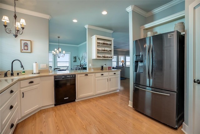 kitchen featuring open shelves, an inviting chandelier, a sink, fridge with ice dispenser, and dishwasher