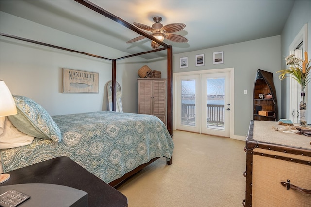 bedroom with access to exterior, carpet, and ceiling fan