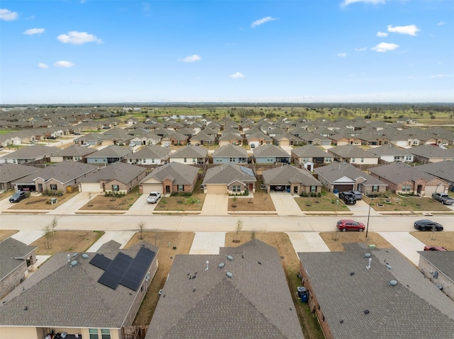 birds eye view of property with a residential view