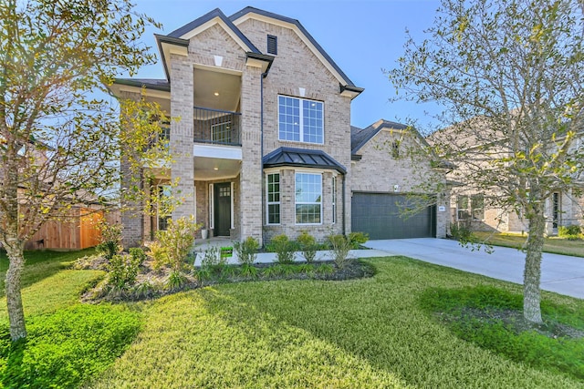 traditional-style home featuring driveway, brick siding, a front yard, and a balcony