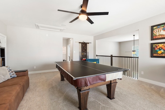 game room with light carpet, ceiling fan, and baseboards