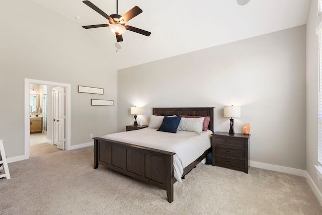 bedroom with light carpet, baseboards, high vaulted ceiling, and a ceiling fan