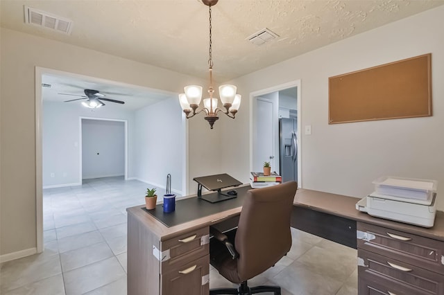 office featuring ceiling fan, visible vents, a textured ceiling, and light tile patterned flooring