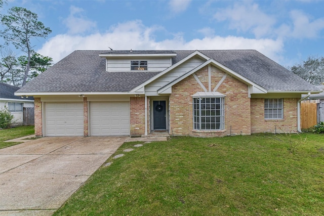 view of front of house featuring a garage, driveway, a front lawn, and roof with shingles