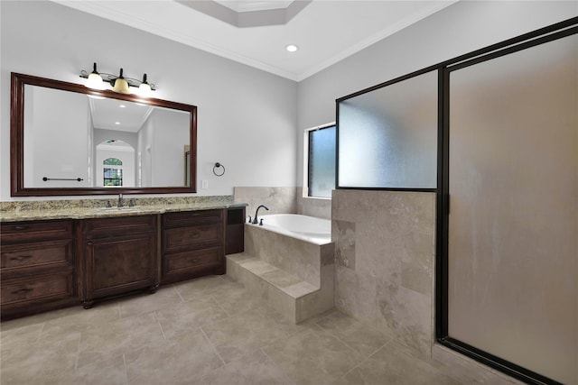 bathroom with ornamental molding, tile patterned floors, vanity, and a bath