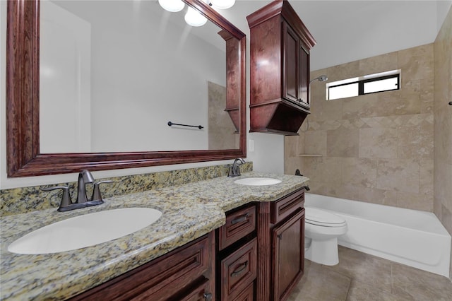 bathroom with shower / washtub combination, a sink, toilet, and double vanity