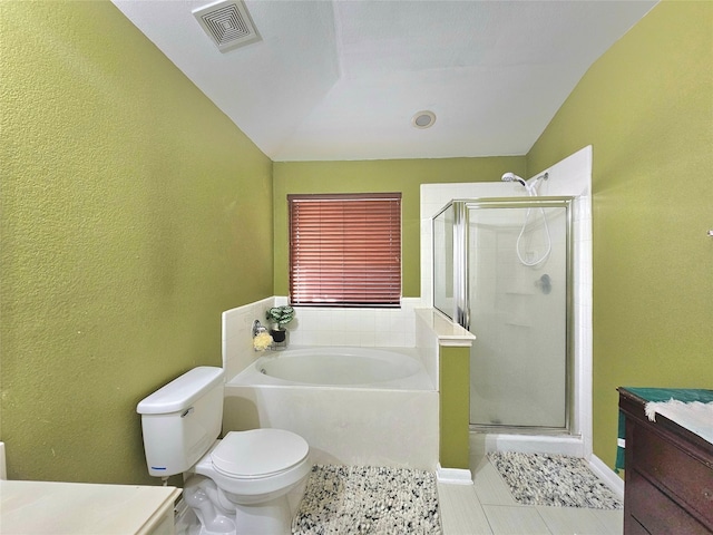 full bathroom with a stall shower, visible vents, toilet, vanity, and a bath