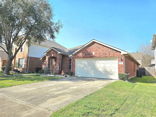 view of front of home with concrete driveway, an attached garage, fence, a front lawn, and brick siding