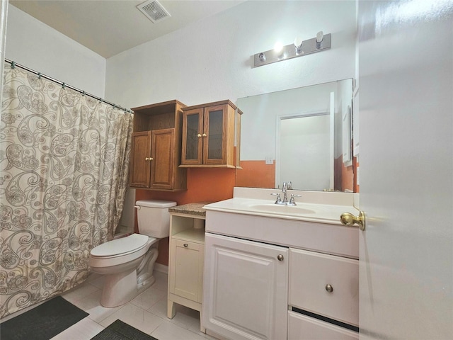 full bath with visible vents, toilet, tile patterned floors, curtained shower, and vanity