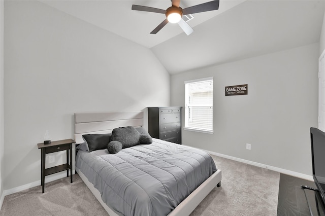 carpeted bedroom with lofted ceiling, baseboards, and a ceiling fan