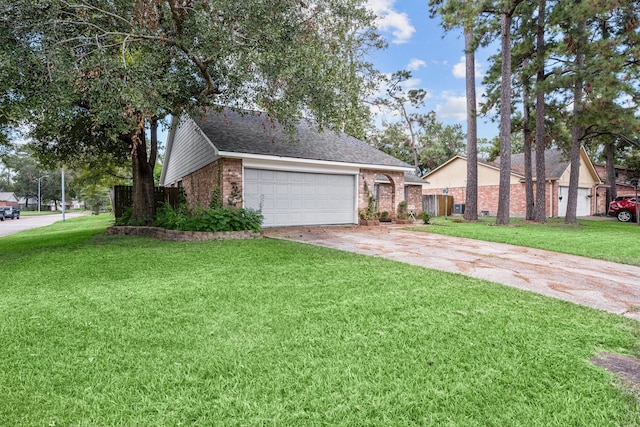 view of front of property with a garage, brick siding, driveway, and a front lawn