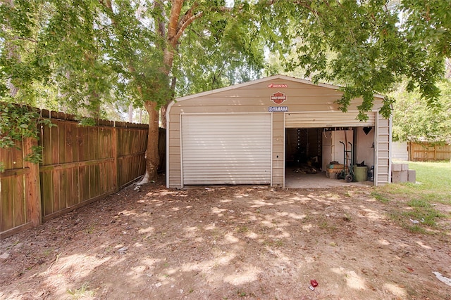 detached garage with fence