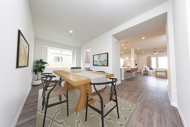 dining room featuring recessed lighting, visible vents, baseboards, and wood finished floors