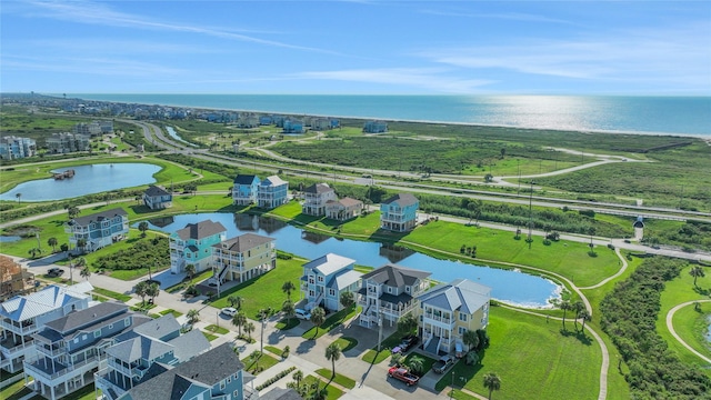 aerial view featuring a water view and a residential view