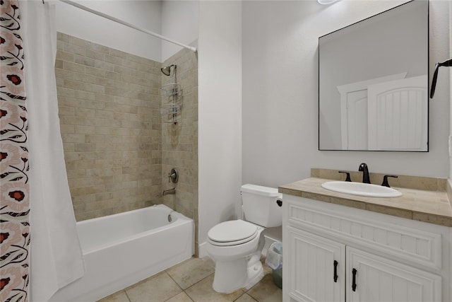 full bathroom featuring shower / tub combo, vanity, toilet, and tile patterned floors