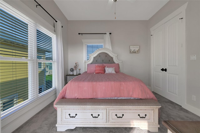 bedroom featuring carpet floors and baseboards