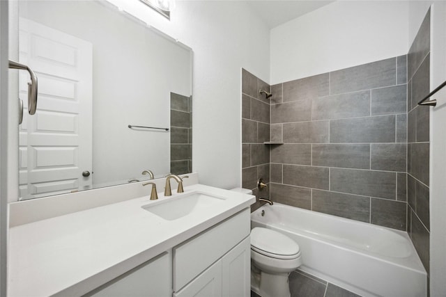 bathroom with vanity, toilet, shower / washtub combination, and tile patterned floors