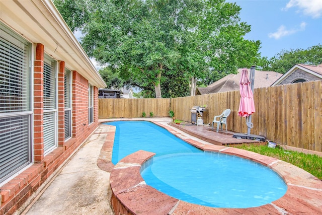 view of pool featuring a fenced backyard and a fenced in pool