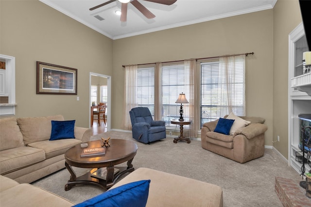 590 Edgewood Dr, Montgomery, TX 77356 - living room with ceiling fan, carpet floors, and crown molding