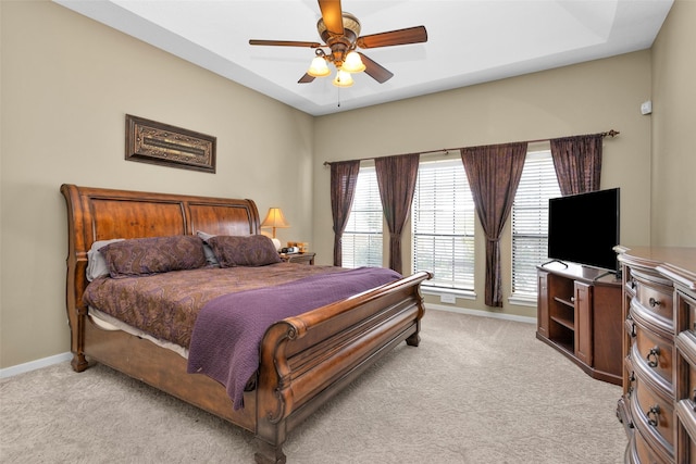 590 Edgewood Dr, Montgomery, TX 77356 - bedroom with light carpet and a ceiling fan
