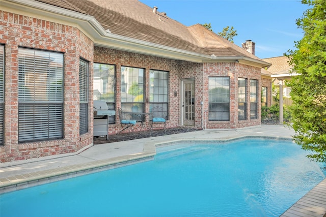 590 Edgewood Dr, Montgomery, TX 77356 - swimming pool with a patio area