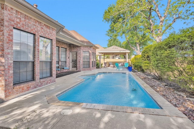 590 Edgewood Dr, Montgomery, TX 77356 - view of swimming pool featuring a gazebo, a patio area, and a fenced backyard