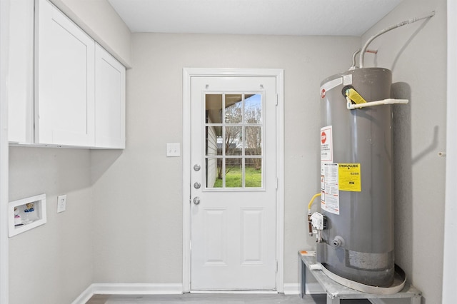 utility room with gas water heater