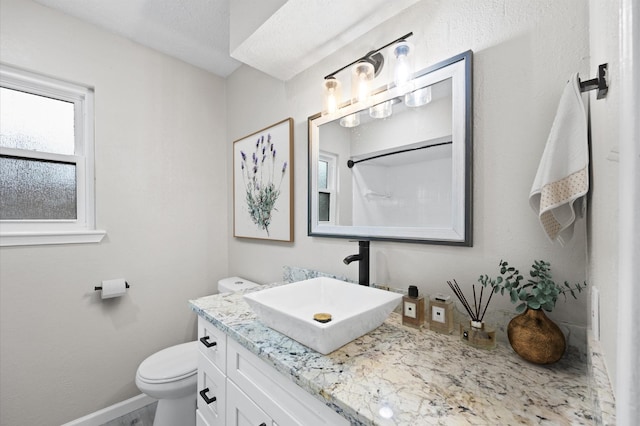 3610 Mossville Ct, Houston, TX 77068 - full bathroom featuring vanity, toilet, baseboards, and a shower